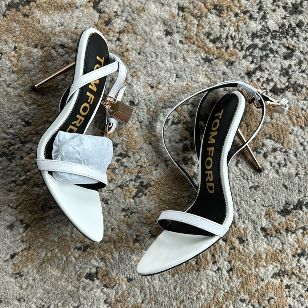 White Tom Ford Padlock heels.